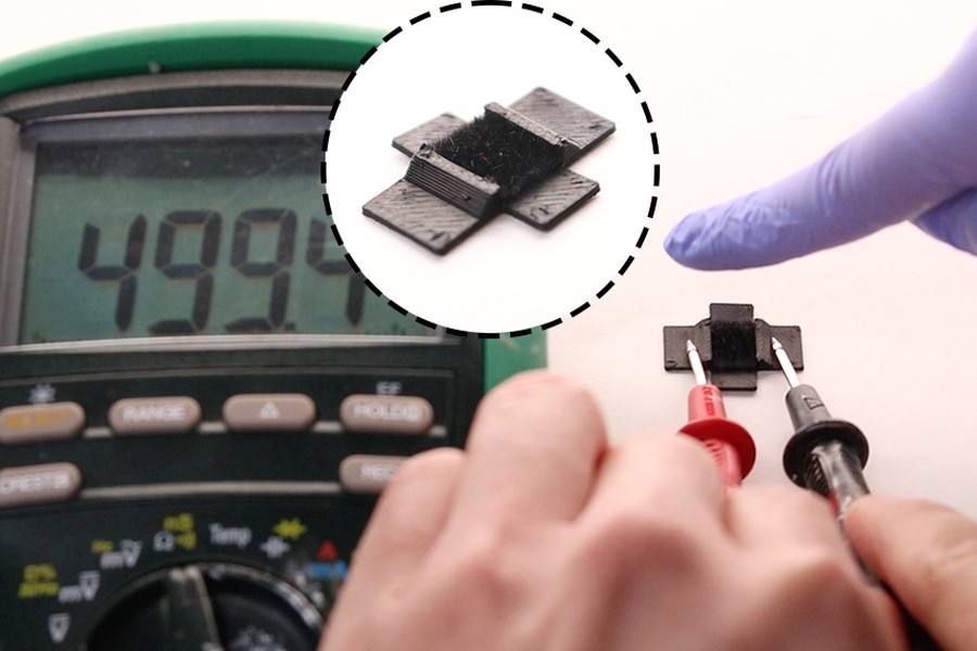 Carbon fiber flocked onto a flexible printed substrate