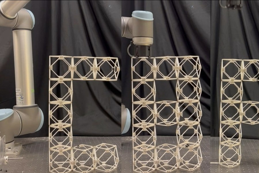 A robotic arm placing voxel blocks in a discrete assembly